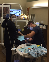 Image of Dr. Dankworth providing restorative dentisty to patients with broken, cracked, or missing teeth in the Oceanside, Fallbrook, and Vista CA areas.