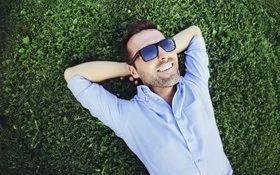 Smiling, relaxed patient after his sedation dentistry appointment with an Oceanside dentist.