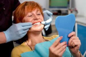 A woman being consulted on a smile makeover in Oceanside.